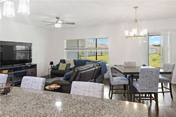 Dining room, Interior, Living room, Pendant Lights, Wood Texture Flooring