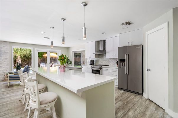 Interior, Kitchen, Pendant Lights, Recessed Lighting, Stainless Steel Appliances, Wood Texture Flooring