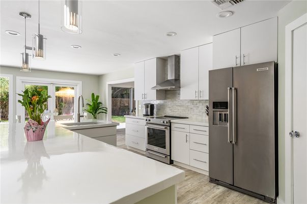 Interior, Kitchen, Pendant Lights, Recessed Lighting, Stainless Steel Appliances, Wood Texture Flooring