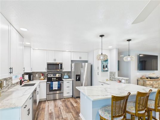 Interior, Kitchen, Pendant Lights, Recessed Lighting, Stainless Steel Appliances, Wood Texture Flooring