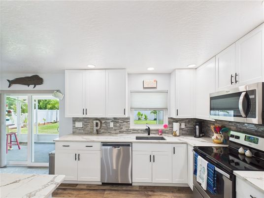 Interior, Kitchen, Recessed Lighting, Stainless Steel Appliances, Wood Texture Flooring