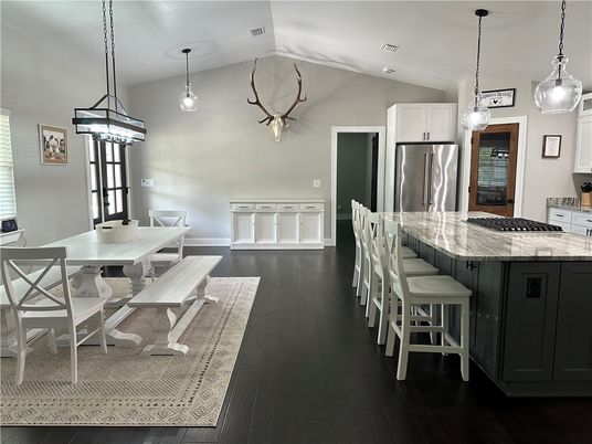 Dining room, Interior, Kitchen, Pendant Lights, Recessed Lighting, Stainless Steel Appliances, Wood Texture Flooring