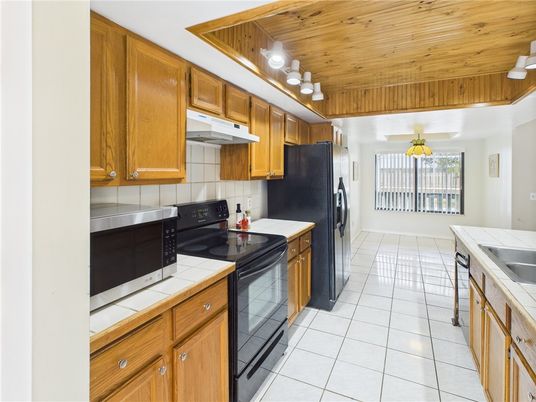Interior, Kitchen, Tile Countertops, Wooden Ceilings