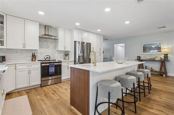 Interior, Kitchen, Recessed Lighting, Stainless Steel Appliances, Wood Texture Flooring