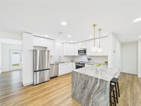 Interior, Kitchen, Pendant Lights, Recessed Lighting, Stainless Steel Appliances, Wood Texture Flooring