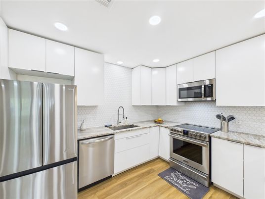 Interior, Kitchen, Recessed Lighting, Stainless Steel Appliances, Wood Texture Flooring