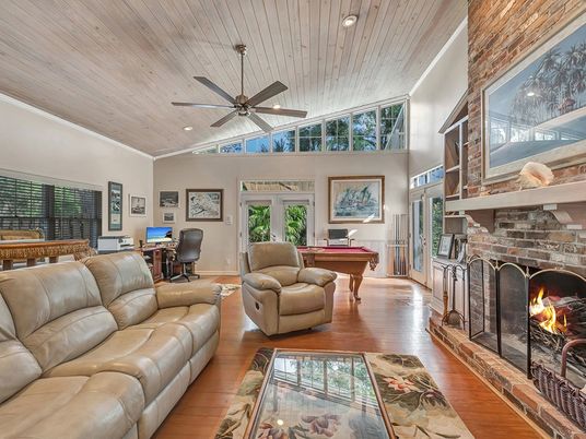 Billiard Table, Fireplace, Game Room, Interior, Living room, Recessed Lighting, Stone Walls, Wooden Ceilings, Wood Texture Flooring