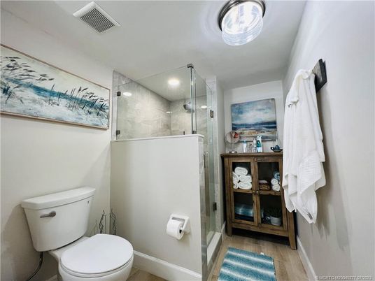 Bathroom, Glass Shower, Interior, Recessed Lighting, Wood Texture Flooring