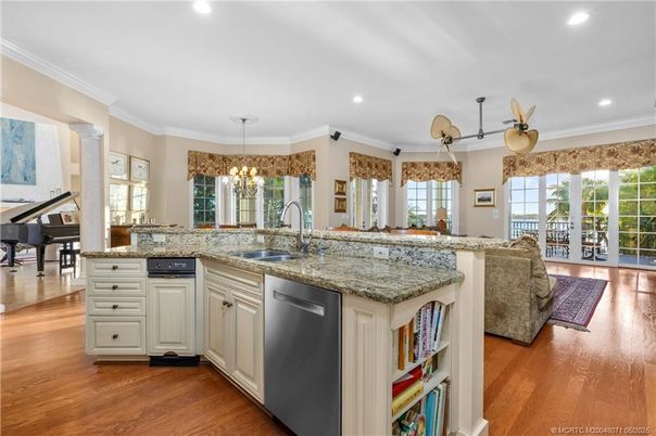 Chandelier, Interior, Kitchen, Pendant Lights, Piano, Recessed Lighting, Wood Texture Flooring