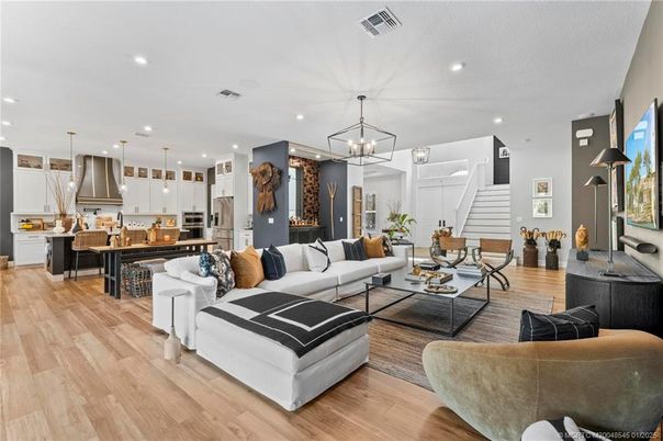 Dining room, Interior, Kitchen, Living room, Pendant Lights, Recessed Lighting, Stainless Steel Appliances, Wood Texture Flooring
