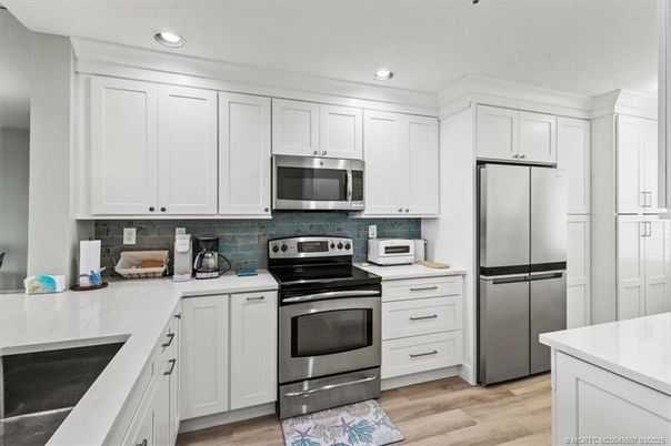 Interior, Kitchen, Recessed Lighting, Stainless Steel Appliances, Wood Texture Flooring