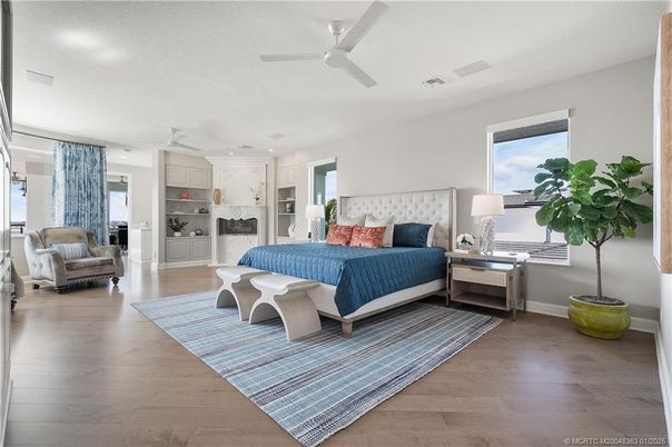 Bedroom, Fireplace, Interior, Kitchen, Recessed Lighting, Wood Texture Flooring
