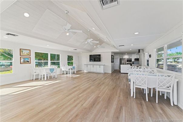 Dining room, Interior, Kitchen, Recessed Lighting, Stainless Steel Appliances, Wood Texture Flooring
