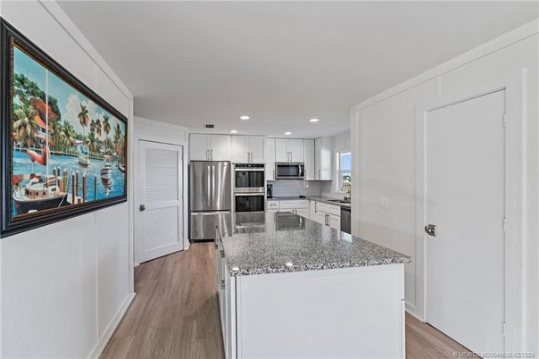 Interior, Kitchen, Recessed Lighting, Stainless Steel Appliances, Wood Texture Flooring
