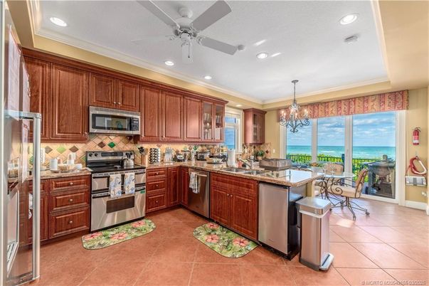 Chandelier, Dining room, Interior, Kitchen, Recessed Lighting, Stainless Steel Appliances, Water