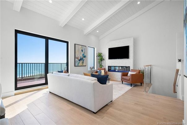 Fireplace, Interior, Living room, Recessed Lighting, Water, Wood Texture Flooring