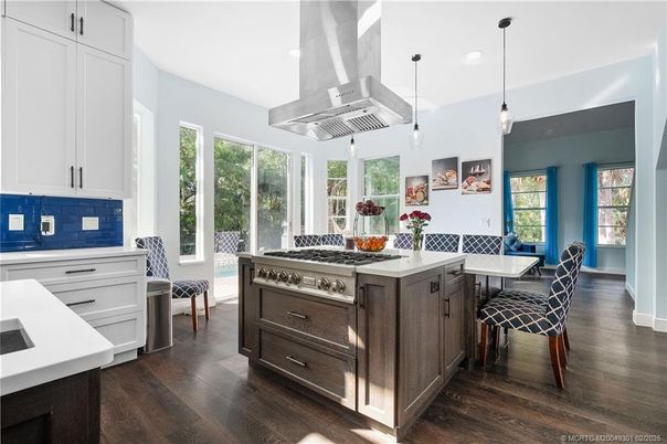 Dining room, Interior, Kitchen, Pendant Lights, Recessed Lighting, Stainless Steel Appliances, Wood Texture Flooring