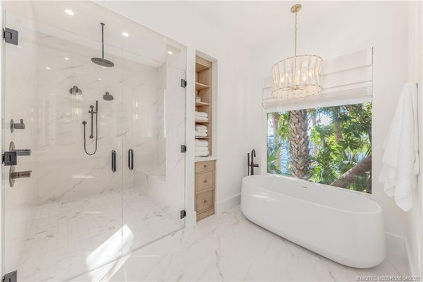 Bathroom, Free Standing Baths, Glass Shower, Interior, Marble, Marble Walls, Pendant Lights, Recessed Lighting