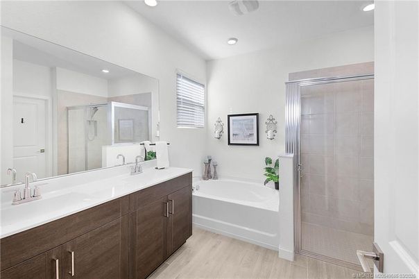 Bathroom, Dual Sink Vanities, Glass Shower, Interior, Recessed Lighting, Wood Texture Flooring