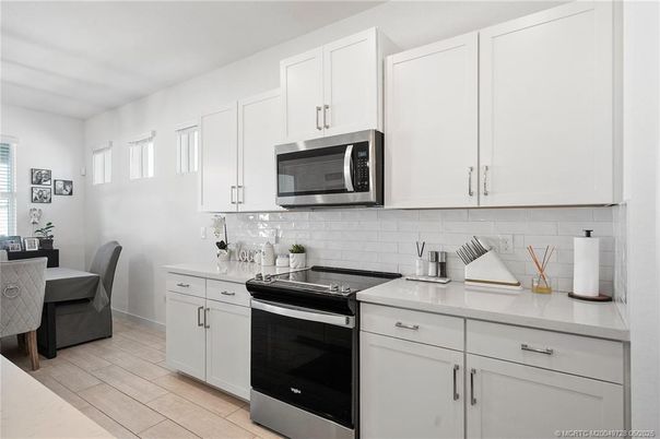 Dining room, Interior, Kitchen, Stainless Steel Appliances, Wood Texture Flooring