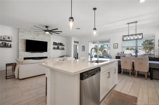 Dining room, Fireplace, Interior, Kitchen, Living room, Pendant Lights, Recessed Lighting, Stone Walls, Wood Texture Flooring