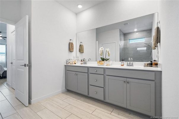 Bathroom, Dual Sink Vanities, Interior, Recessed Lighting, Wood Texture Flooring
