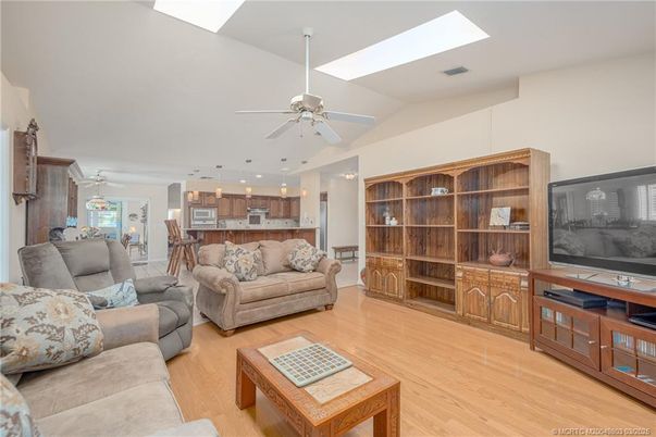Dining room, Interior, Kitchen, Living room, Pendant Lights, Recessed Lighting, Stainless Steel Appliances, Wood Texture Flooring
