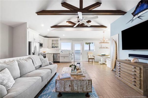 Chandelier, Dining room, Interior, Kitchen, Living room, Recessed Lighting, Stainless Steel Appliances, Wooden Beams, Wood Texture Flooring