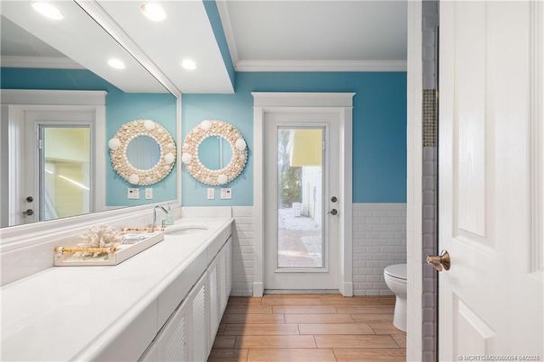 Bathroom, Dual Sink Vanities, Interior, Recessed Lighting, Wood Texture Flooring