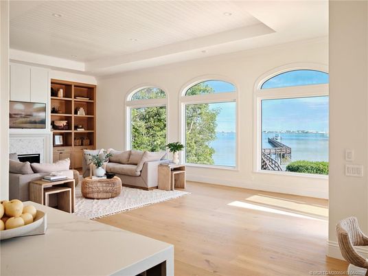 Fireplace, Interior, Living room, Recessed Lighting, Water, Wood Texture Flooring