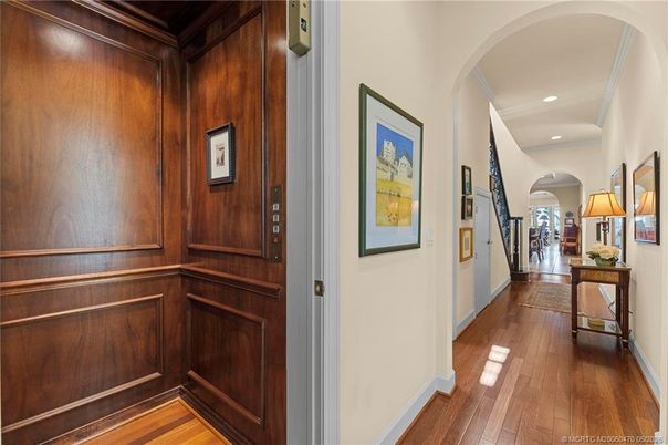 Elevator, Interior, Recessed Lighting, Wood Texture Flooring, Wooden Walls