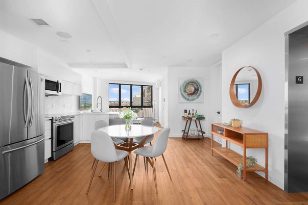 Dining room, Interior, Kitchen, Recessed Lighting, Stainless Steel Appliances, Wood Texture Flooring