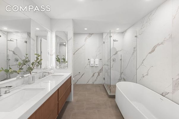 Bathroom, Dual Sink Vanities, Free Standing Baths, Glass Shower, Interior, Marble Walls, Recessed Lighting