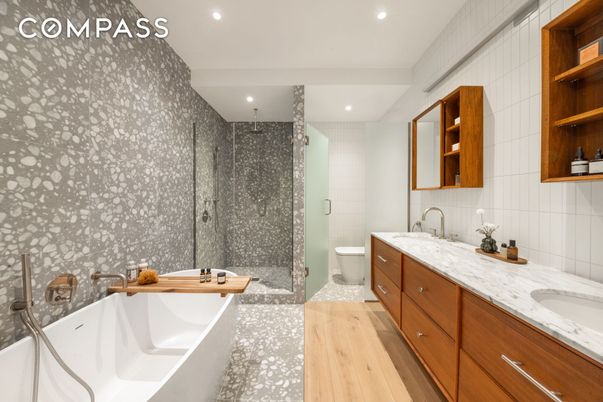 Bathroom, Dual Sink Vanities, Glass Shower, Interior, Recessed Lighting, Wood Texture Flooring