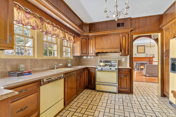 Chandelier, Fireplace, Interior, Kitchen, Stainless Steel Appliances, Wood Texture Flooring
