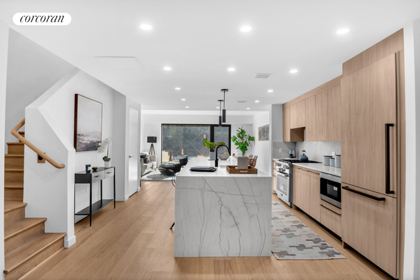 Interior, Kitchen, Marble Walls, Pendant Lights, Recessed Lighting, Stainless Steel Appliances, Wood Texture Flooring