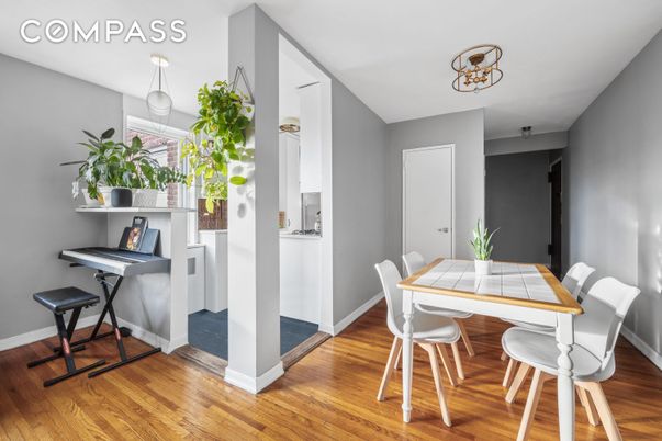 Dining room, Interior, Pendant Lights, Piano, Wood Texture Flooring