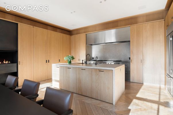 Fireplace, Interior, Kitchen, Recessed Lighting, Stainless Steel Appliances, Wood Texture Flooring