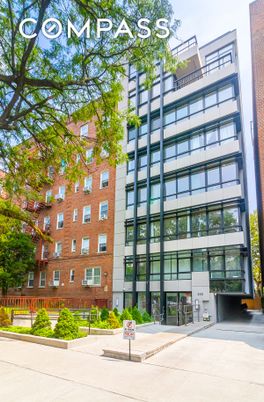 Exterior, Facade, Brick Facade, Condo Building