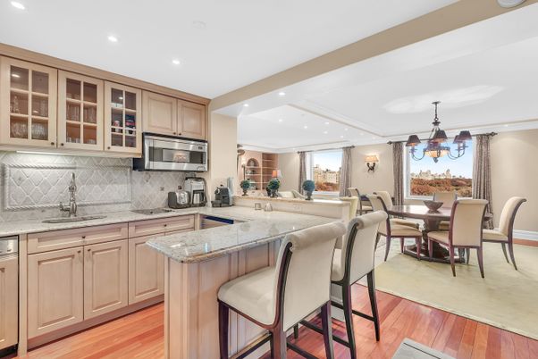 Chandelier, Dining room, Interior, Kitchen, Recessed Lighting, Stainless Steel Appliances, Wood Texture Flooring