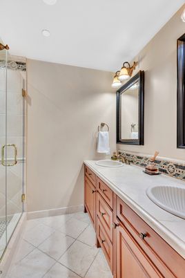Bathroom, Dual Sink Vanities, Glass Shower, Interior, Recessed Lighting, Tile Countertops