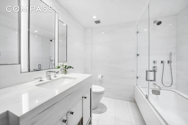 Bathroom, Dual Sink Vanities, Glass Shower, Interior, Marble Walls, Recessed Lighting