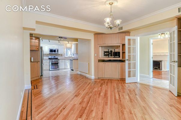 Chandelier, Empty room, Interior, Kitchen, Stainless Steel Appliances, Wood Texture Flooring