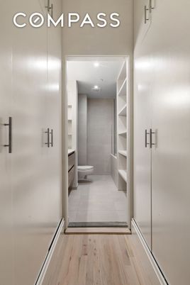 Bathroom, Glass Shower, Interior, Recessed Lighting, Walk-in Closets, Wood Texture Flooring