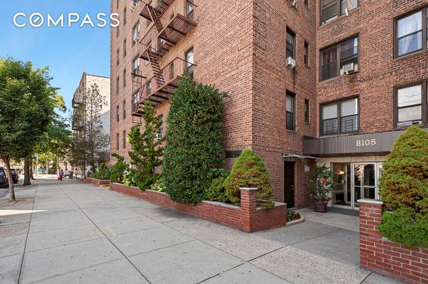 Exterior, Facade, Brick Facade, Condo Building