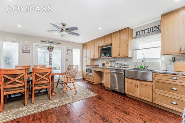 Dining room, Interior, Kitchen, Recessed Lighting, Stainless Steel Appliances, Wood Texture Flooring