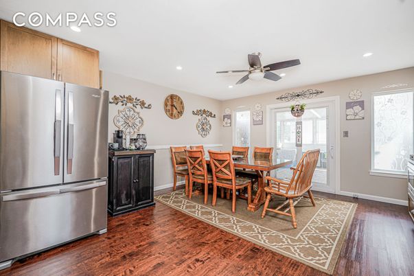 Dining room, Interior, Kitchen, Recessed Lighting, Stainless Steel Appliances, Wood Texture Flooring
