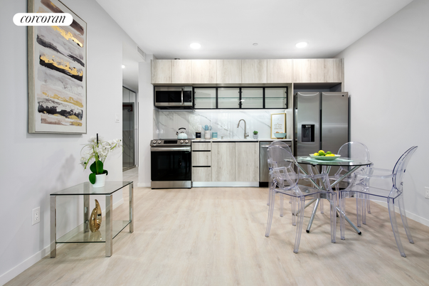 Dining room, Interior, Kitchen, Marble Walls, Recessed Lighting, Stainless Steel Appliances, Wood Texture Flooring