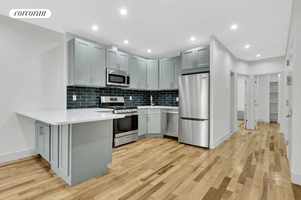 Interior, Kitchen, Recessed Lighting, Stainless Steel Appliances, Wood Texture Flooring