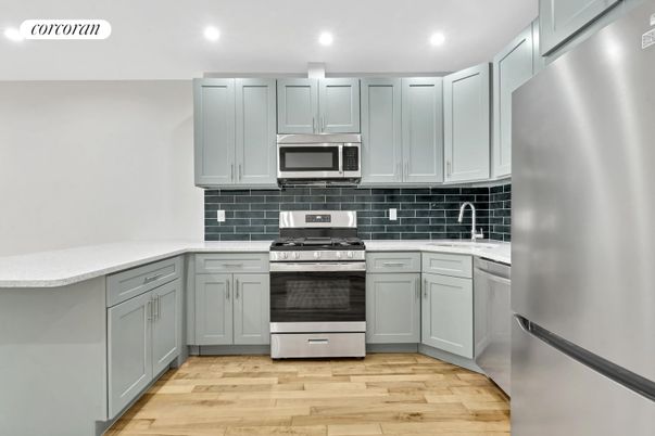 Interior, Kitchen, Recessed Lighting, Stainless Steel Appliances, Wood Texture Flooring
